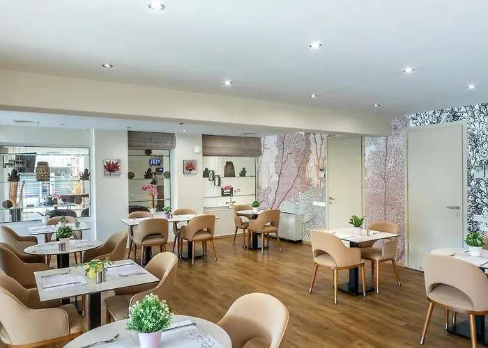 Отель Almond Business